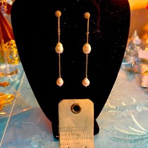 Anthropology, 3 inch drop natural pearl and Crystal, gold tone chain earrings.
